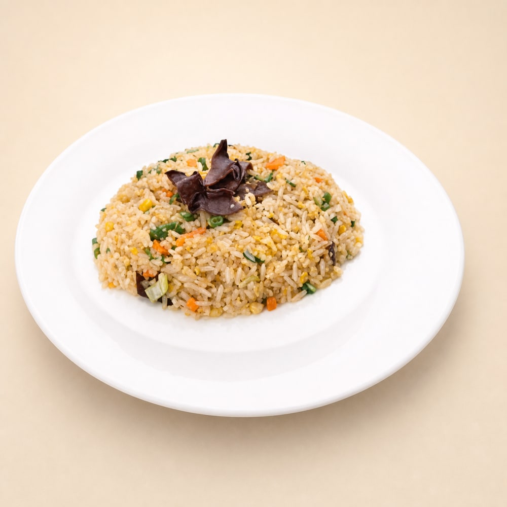 Vegetarian golden fried rice with egg and vegetables
